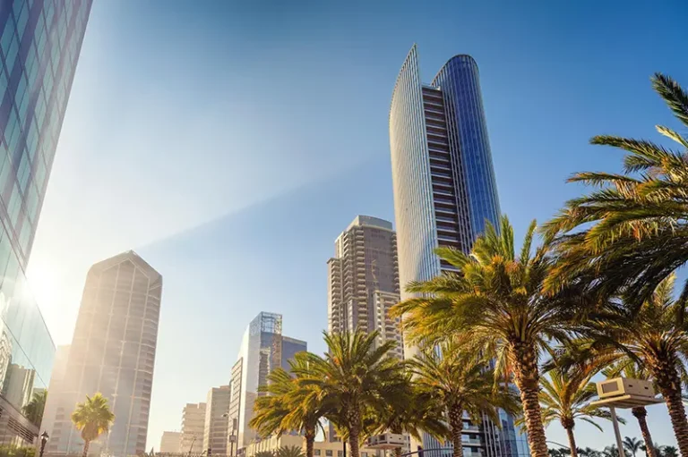 Skyscrapers and palm trees on a sunny day in San Diego